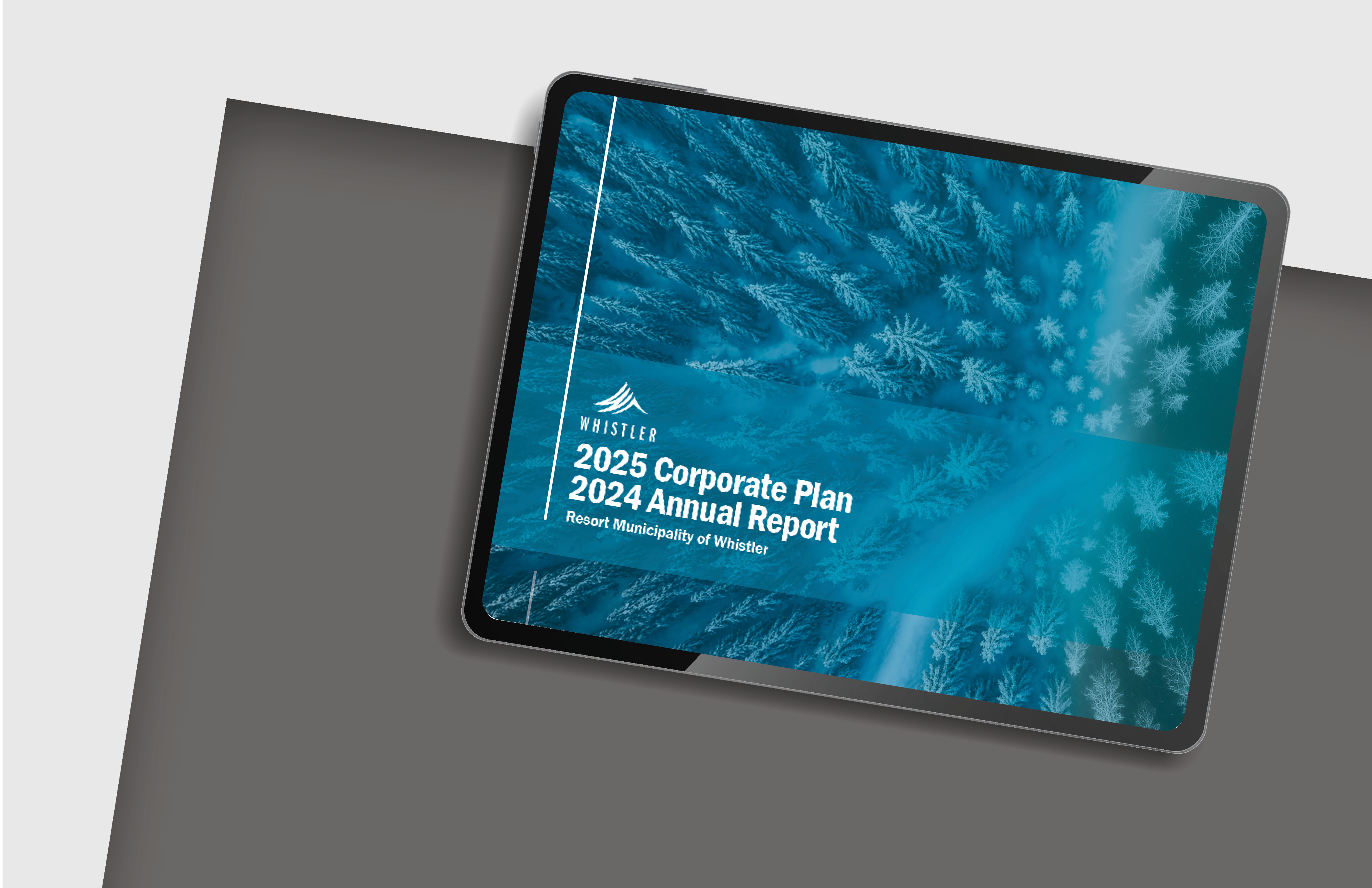A mockup of the RMOW 2025 Corporate Plan 2024 Annual Report displaying the cover of the report on a tablet device.